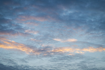 Naklejka na ściany i meble Bright sky with fluffy white clouds natural background