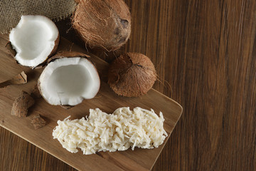 Cocada, coconut candy. Composition on wooden background