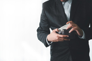 business man counting banknote on white background