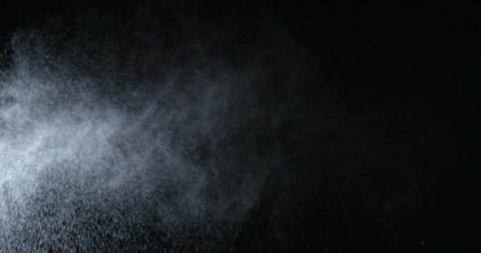 Water spray, microbes in air simulation, on black background
