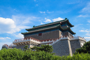 Fototapeta premium ZhengYang Gate under cloudy blue sky in Qianmen street, southern Beijing