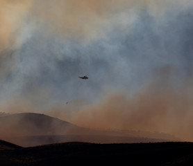 fire and smoke with helicopter