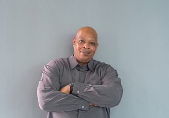 Portrait of happy smiling senior old elderly business Black African American man person standing...