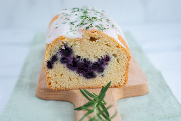 home made sweet blueberry sponge cake with rosemary