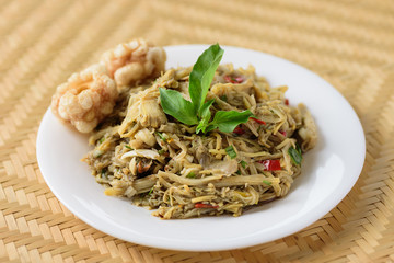 Northern Thai food (Yum Nor Mai), Spicy bamboo shoot salad with crab paste eating with pork rind, Local Thai food
