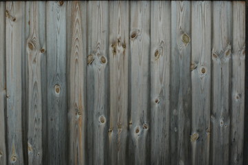 Old brown wood background made of dark natural wood in grunge style. The view from the top. Copy space