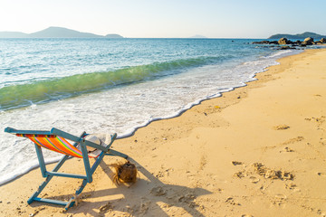 Fototapeta na wymiar Deck chair at the beach