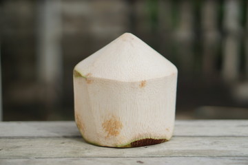 close up Peeled coconut balls for sale.