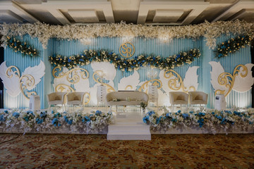 luxury wedding stage decoration background. white and blue theme concept. hanging flower