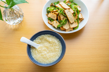 Chinese food millet porridge and green pepper sauteed dry