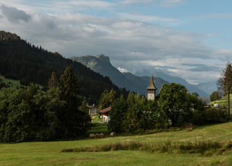 Fototapeta na wymiar A village in the Regional Park Gruyère Pays-d'Enhaut, Switzerland 