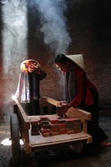 Photo of traditional craft village: normal life is lined with bricks in brick kilns (Vietnam)