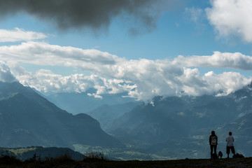 People enjoying view from Berneuse, mountain in Switzerland 