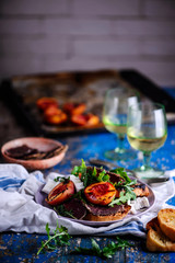 Grilled peaches, goat cheese, and bresaola salad..