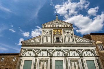 Fototapeta na wymiar Florence. Facade of the famous Basilica of San Miniato al Monte in Florentine Romanesque style (1013 - XII century). UNESCO world heritage site, Tuscany, Italy, Europe