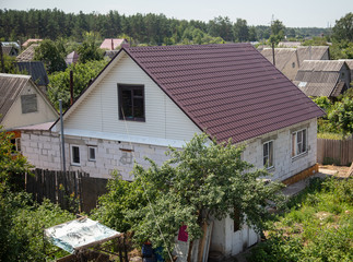 Fototapeta na wymiar Unfinished house in the village