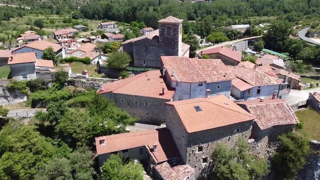 Aerial view approaching village on natural bridge in Puentedey, Burgos