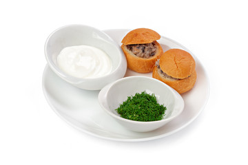 Julienne with mushrooms served in bread isolated on white