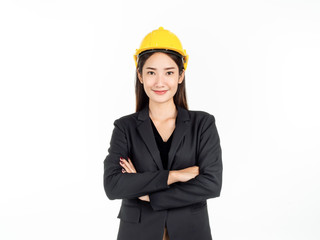 Young Asian businesswoman wearing black suit and yellow safety helmet. Portrait of female engineer looking confident.