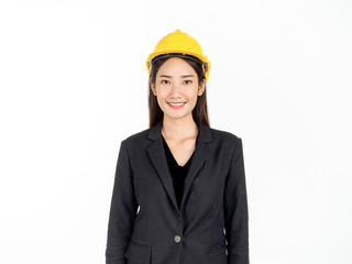 Young Asian businesswoman wearing black suit and yellow safety helmet. Portrait of female engineer looking confident.