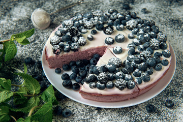 Sliced cottage cheese casserole and sprinkled with iced sugar backdrop.