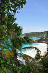 Fototapeta na wymiar Elevated view of the La Digue Island coastline withe the bay in front of Petite Anse. Seychelles