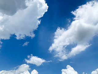 Beautiful blue sky with white clouds for background. - 373423400