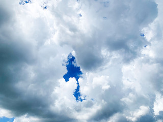 Beautiful blue sky with white clouds for background. - 373423426