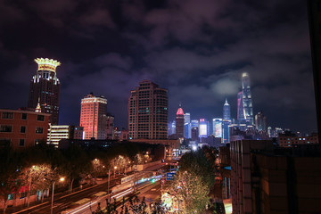 Modern city at night. Shanghai scenery at night. Shanghai cloud at night. Romantic nightscape and peaceful streetscape of a modern city.