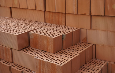 Stack of clay orange bricks