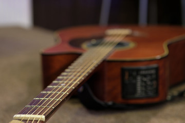 the guitar is on the stage of the concert hall