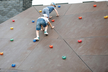 Boy on a climbing wall