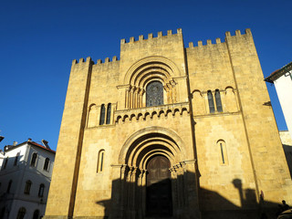 Fototapeta na wymiar West façade of the Old Cathedral of Coimbra (Sé Velha de Coimbra) in Coimbra, PORTUGAL