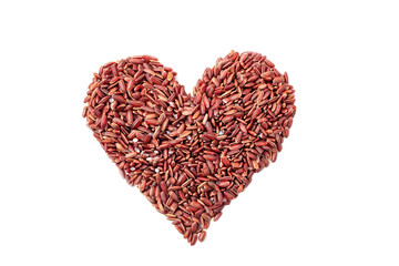 Obraz na płótnie Canvas Heap of raw wild brown rice in the shape of a heart isolated on white background. Red grains, top view. Organic natural food, health care. An ingredient for traditional Asian cuisine.