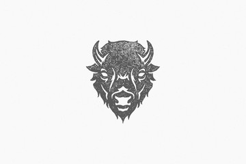 Silhouette of head of wild buffalo or bison as symbol of nature exploration hand drawn stamp effect vector illustration. © provectors