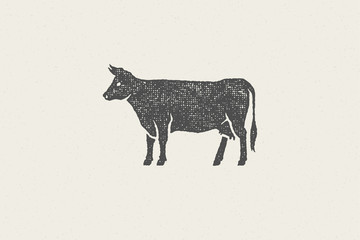 Black cow silhouette for meat industry or farmers market hand drawn stamp effect vector illustration.