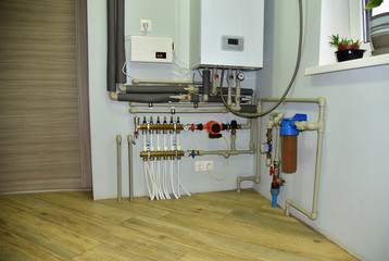 Independent heating system in boiler room at home. Domestic water supply system. Water supply for...