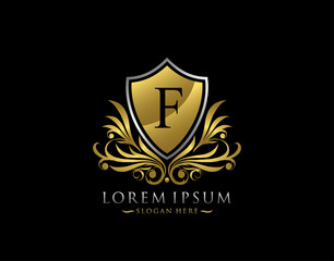 Luxury Shield F Letter Logo. Graceful Elegant gold shield icon design.