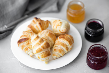 small homemade croissants with berry jam