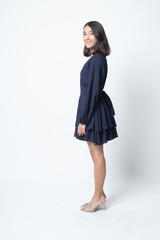 Full body side view of beautiful young asian woman.