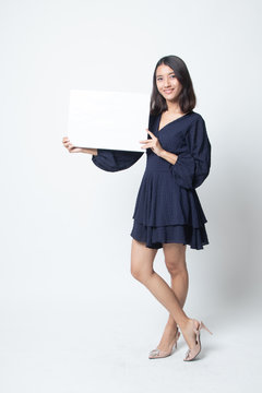 Full body of young Asian woman with white blank sign.