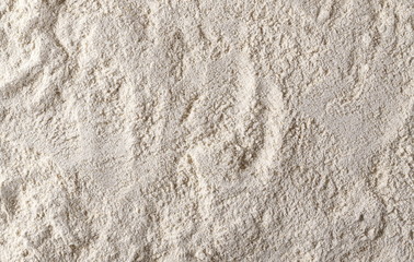 Whole grain barley flour background and texture