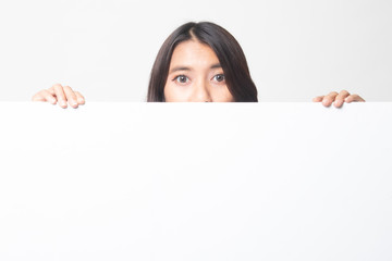 Close up of young Asian woman behind a blank sign.