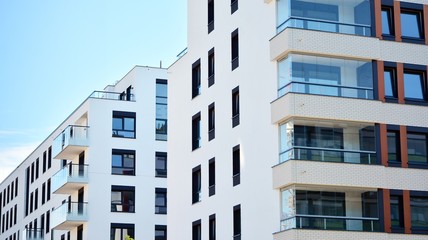 Obraz premium Architectural details of modern apartment building. Modern european residential apartment building complex.