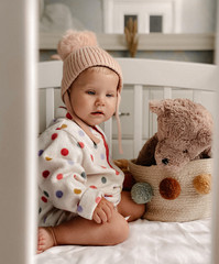 baby girl with teddy bear