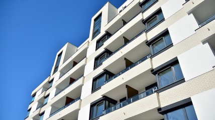 Architectural details of modern apartment building. Modern european residential apartment building complex.