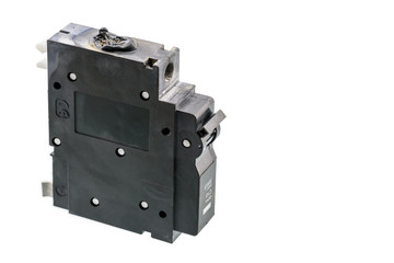 Burnt electrical breaker due to overload / improper copper wire insertion. Melting hole after arc-faulting. Electrical equipment damage from loosen wire that cause arcing. Isolated on white background