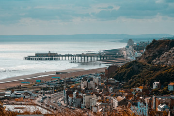 Hastings, England - September 16, 2009: View of Hastings Old Town and Pier from East Hill, East Sussex