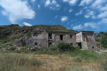 Fototapeta na wymiar ruined farmhouse in the mountain