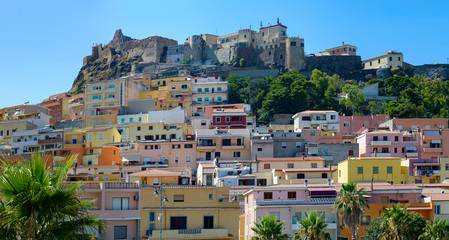 Castel and colorful houses in Castelsardo town, Sardinia, Italy.